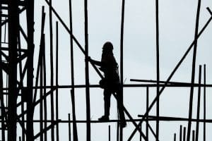 Construction Worker Silhouette on Scaffolding