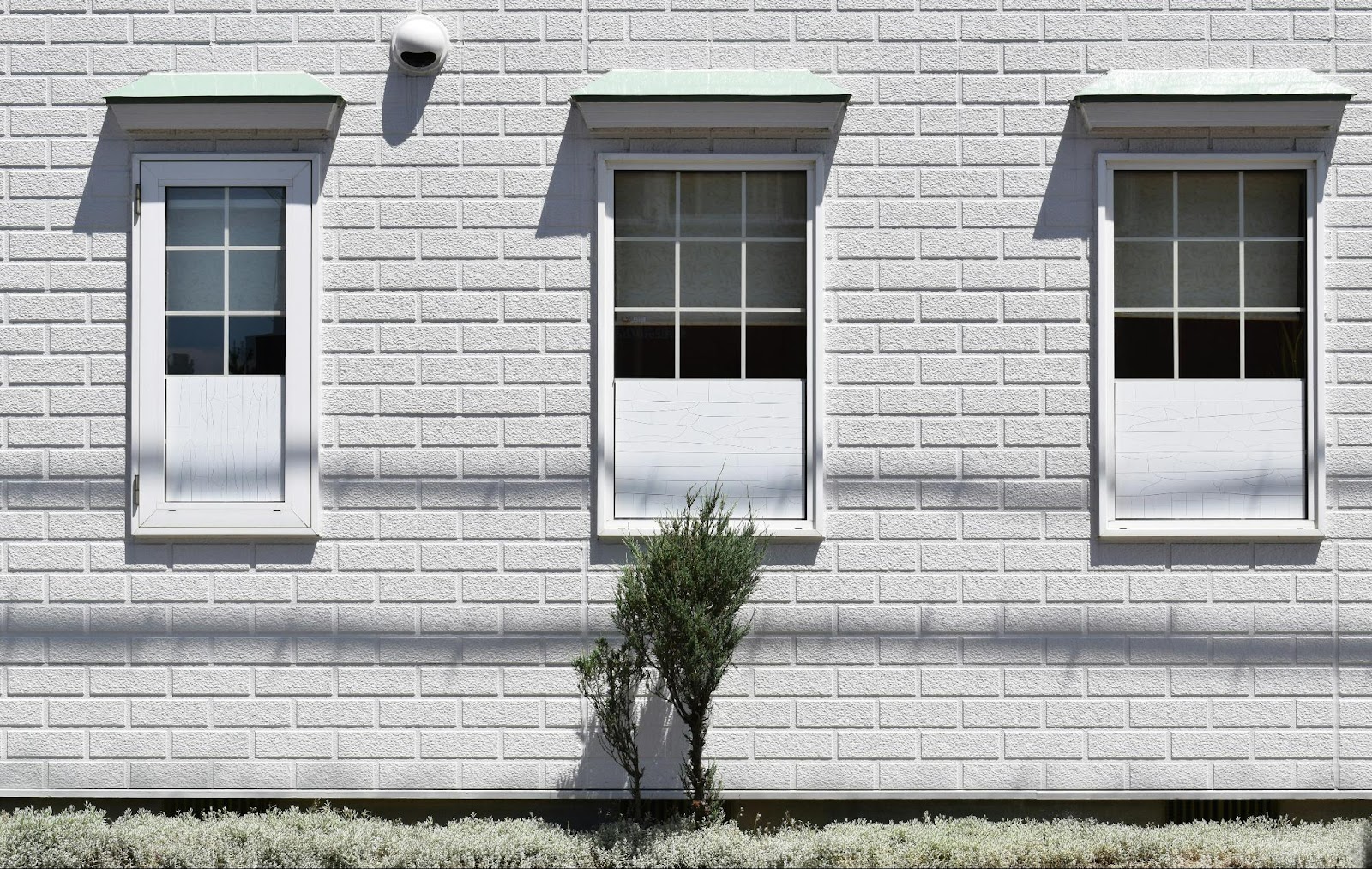 White Brick Wall With Window Design