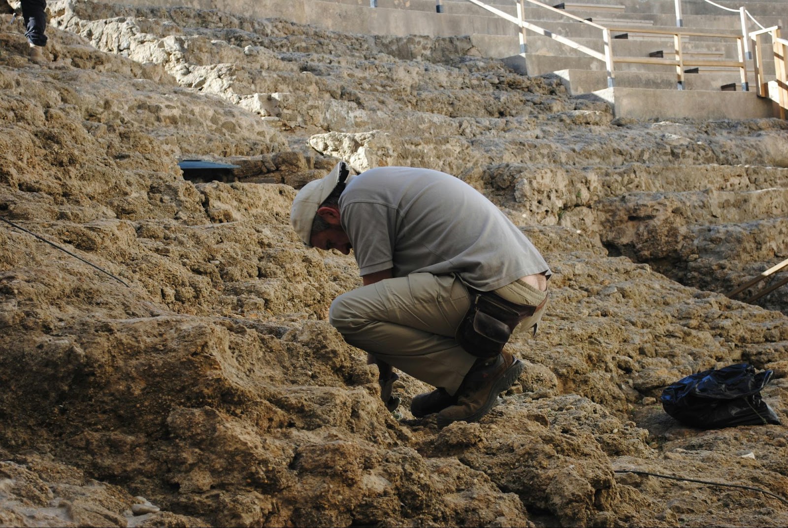 Man Searching Something in Rock Land
